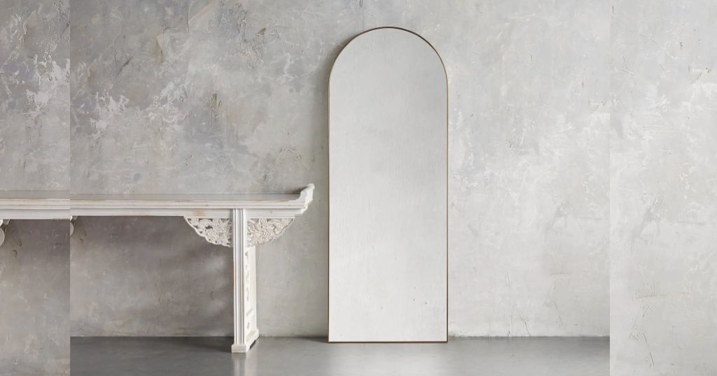 Arched full-length floor mirror that is 69 inches tall