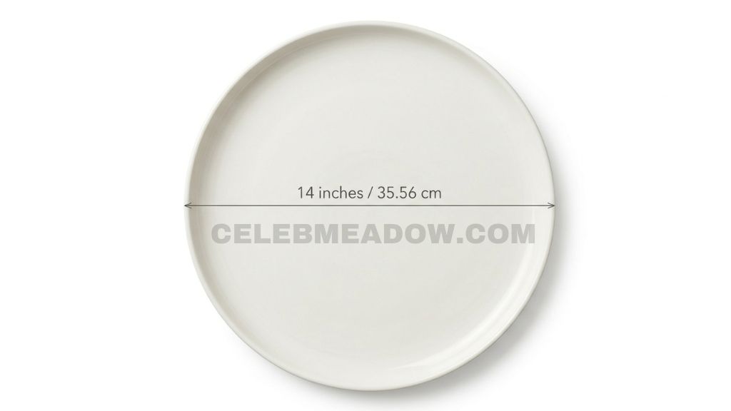 Large ceramic serving platter approximately 14 inches in diameter shown next to a standard dinner plate for size comparison