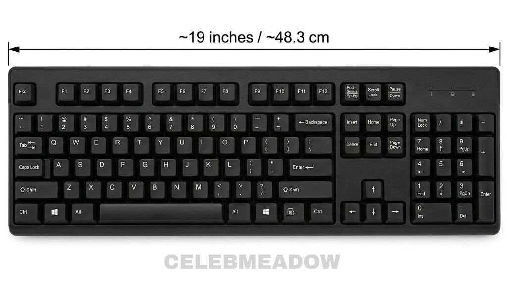 Top-down view of a full-size keyboard with numeric keypad, measurement arrow showing approximately 19 inches across the width
