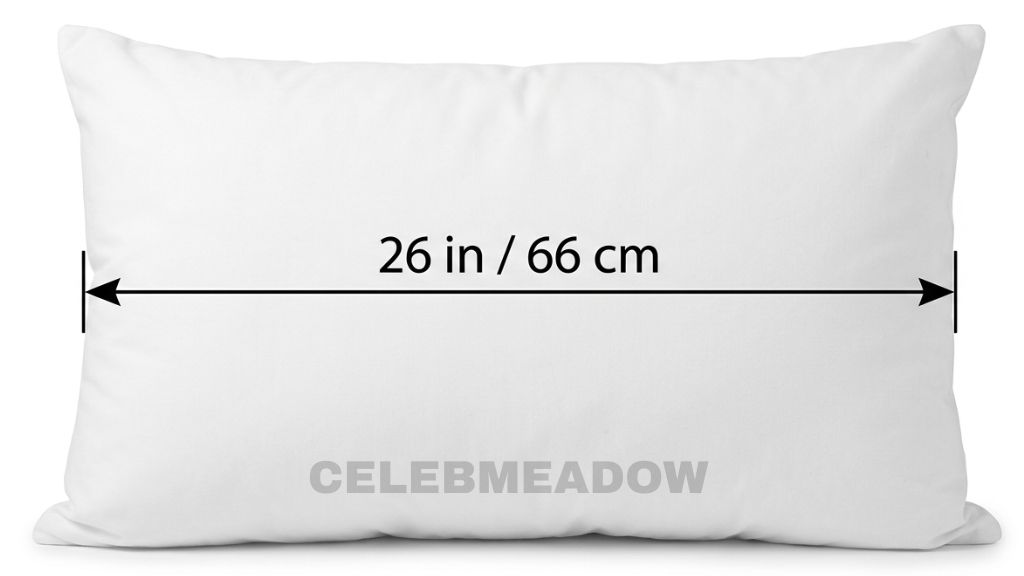 King-size pillow measuring 20 by 26 inches, shown lying flat on a bed with pillowcase